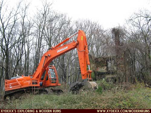 Construction equipment outside the front of the house