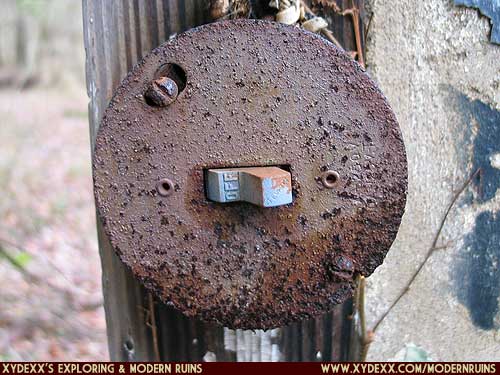 Closeup view of a rusted lightswitch